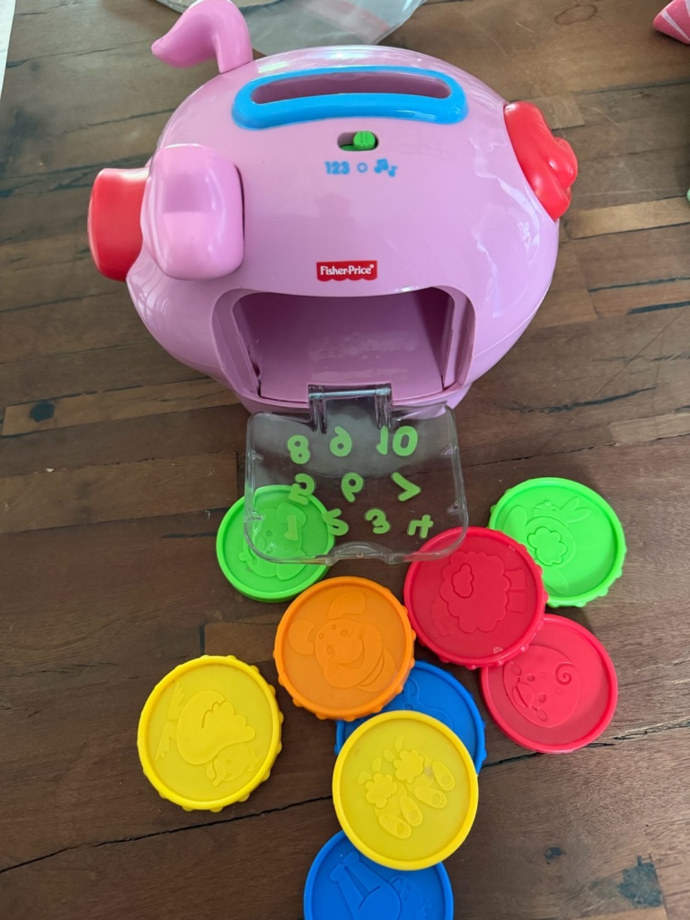 Fisher-Price Pink Piggy Number Sorting Toy with 9 Colorful Discs - Picture 4 of 4